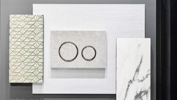 La plaque de déclenchement Sigma21 à l’aspect béton avec anneaux design chromés La plaque de déclenchement Sigma21 à l’aspect béton avec anneaux design chromés