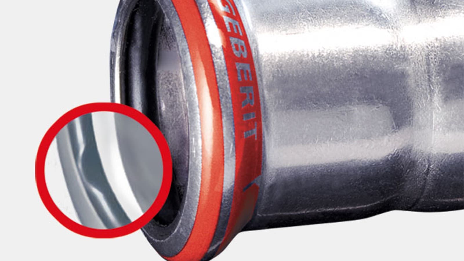 Geberit Mapress Carbon Steel fitting with red pressing indicator and black O-ring Geberit Mapress Carbon Steel fitting with red pressing indicator and black O-ring